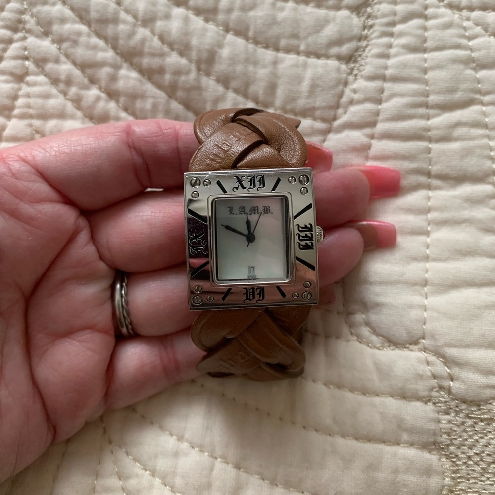 LAMB watch with leather band. Works great but needs battery.